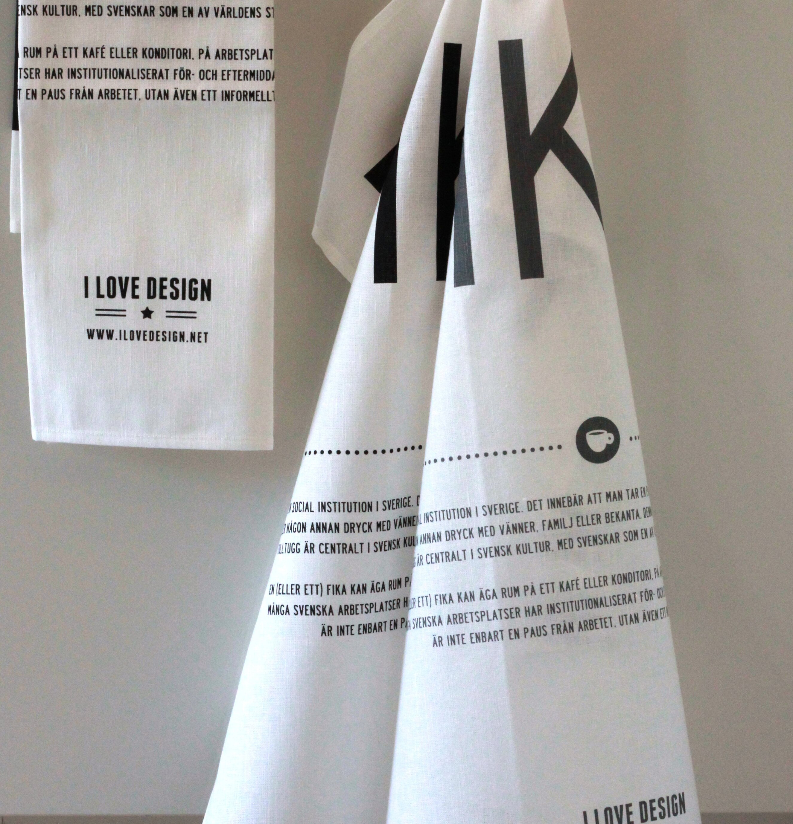 Kökshandduk FIKA Grå från I Love Design hänger på krok