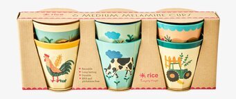 Bild av sex charmiga lantliga muggar i kartongförpackning