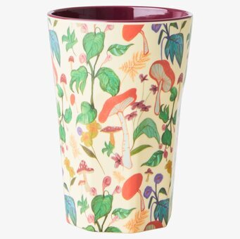 Bild av färgglad mugg med svamp- och blommönster