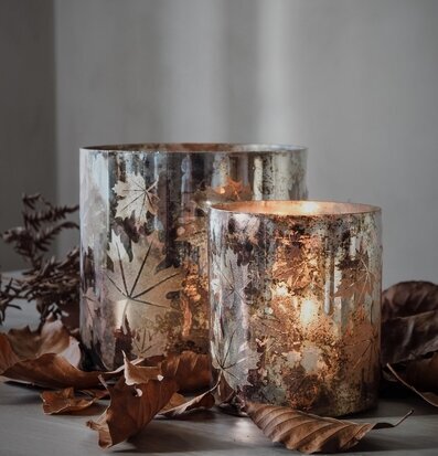 Bild av ljuslyktor som skapar höstmys och värme