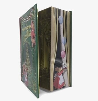 Bild av dekorativ plåtburk med julinspirerad design