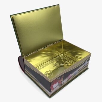 Bild av kreativ plåtburk i bokform för julförvaring