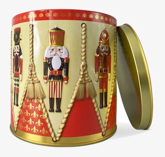 Foto av färgstark plåtburk med nötknäpparmotiv