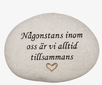 Vit Sten Med Graverad Text - Någonstans Inom Oss från Different Design