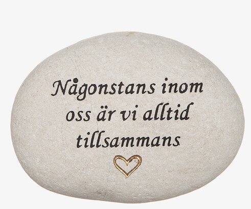 Vit Sten Med Graverad Text - Någonstans Inom Oss från Different Design