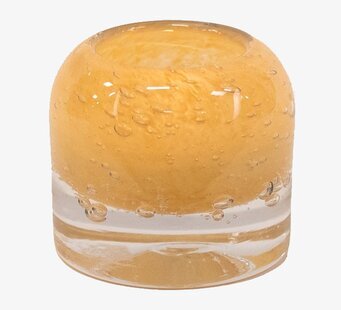 Foto av stilfull ljuskopp i glas med gyllene insida