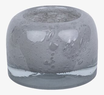 Bild av ljuskopp i ljusgrått glas med bubbeltextur