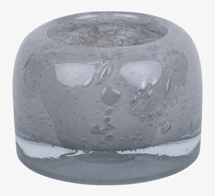 Bild av ljuskopp i ljusgrått glas med bubbeltextur