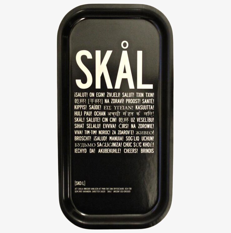 Bricka Skål från I Love Design med vit text på svart yta