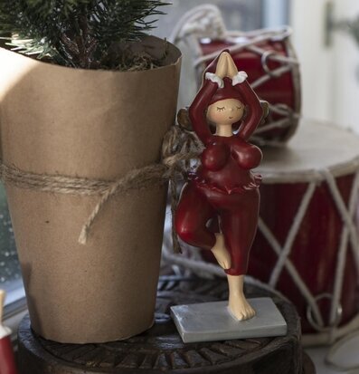 Tomtetjej Yoga från IB Laursen i yogaposition på ett ben