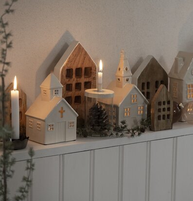 Bild av stilfullt arrangemang med dekorativa hus