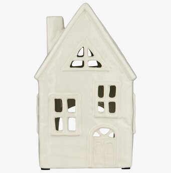 Bild av ljuslykta med charmigt husdesign och glans