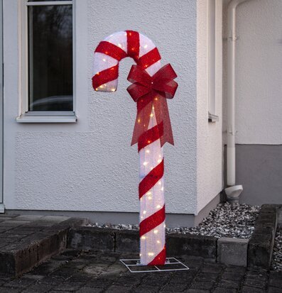 Utomhusdekoration CandyCane XL från Star Trading nära husvägg