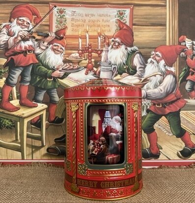 Bild av färgglad julplåtburk med traditionellt motiv