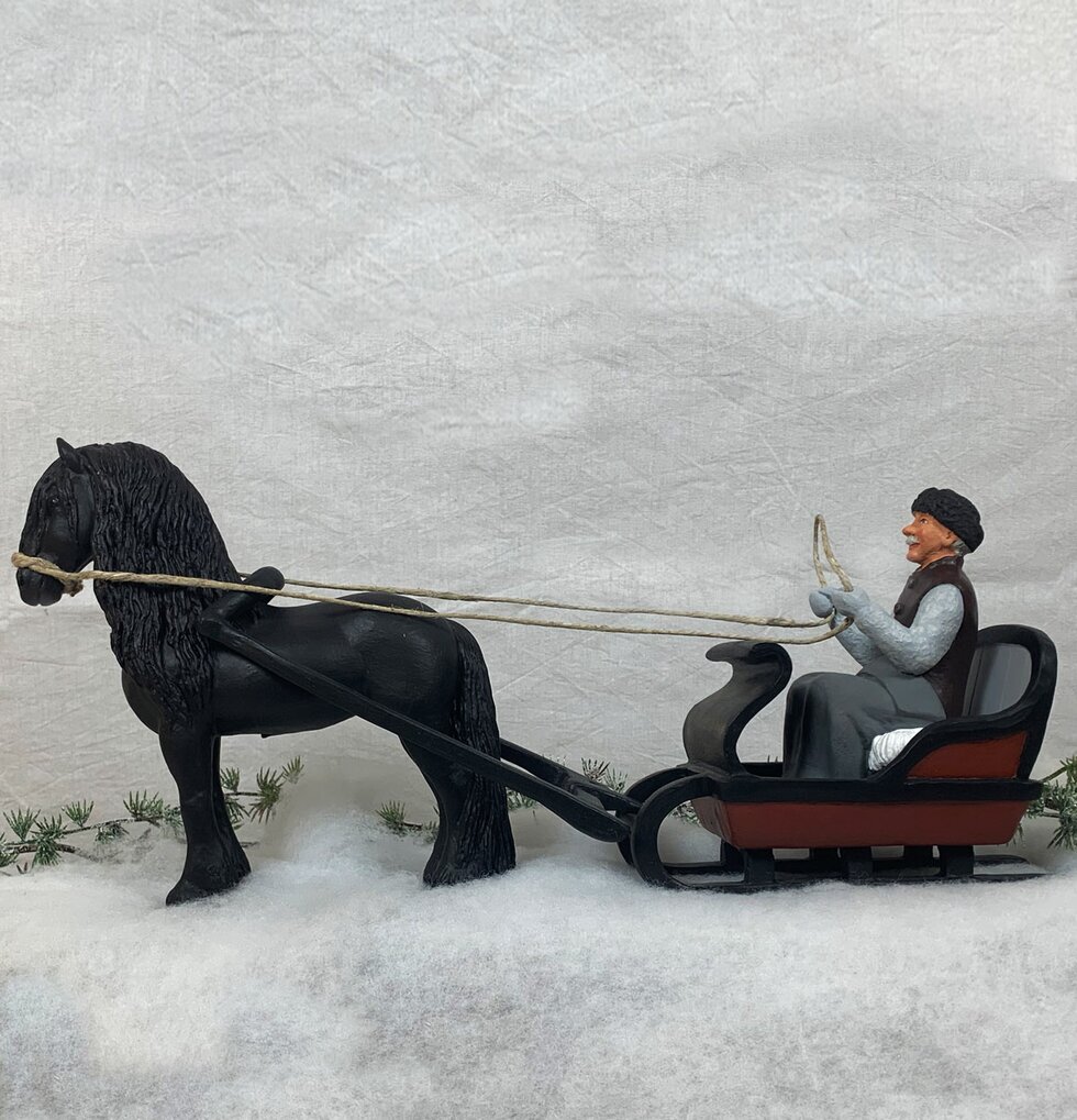 Anton, Släde och Atlas från Sverigealmanackan i vinterscen