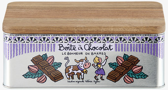 Bild av plåtburk med humoristisk och färgglad design