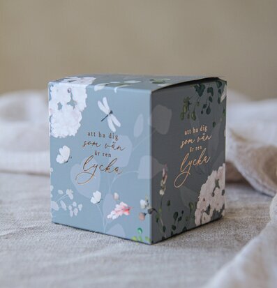 Bild av elegant förpackning med vänskapligt budskap