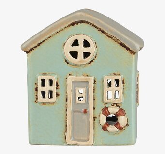 Bild av charmig ljuslykta formad som ett litet hus