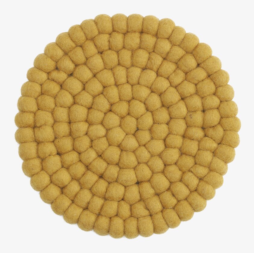 Grytunderlägg Tovad Ull - Ochre från Gry & Sif, rund form