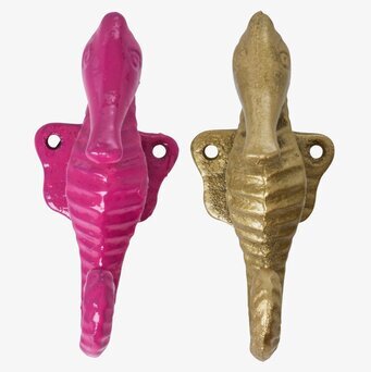 Väggkrok Sjöhäst från Rice i rosa och guld mot vit bakgrund