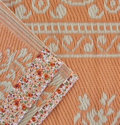 Plastmatta Coral/OffWhite från Rice med geometriskt mönster