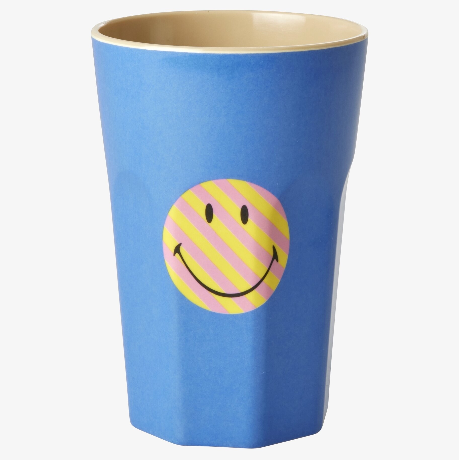 Bild av färgglad mugg med smiley och blå yta