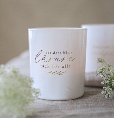 Bild av ljuslykta med text för världens bästa lärare