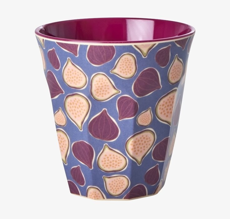 Bild av färgglad mugg med fikonmönster och blå bakgrund