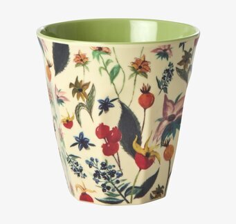 Bild av melaminmugg med blommigt mönster och grön insida