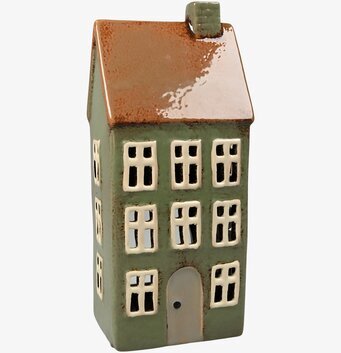 Bild av ljuslykta i form av ett klassiskt hus