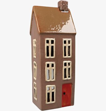 Bild av dekorativ ljuslykta i form av ett hus