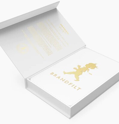 Brandfilt Vit/Guld Tablebook från Solstickan i bokformat