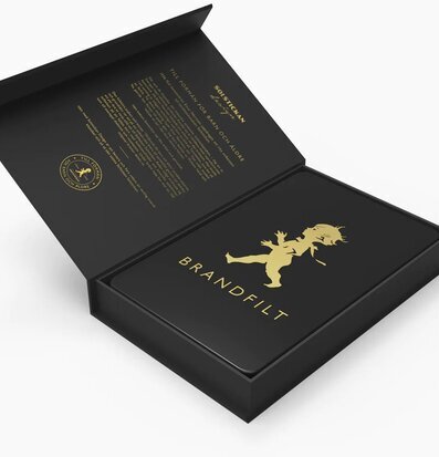 Solstickan Brandfilt Svart/Guld Tablebook i elegant bokform