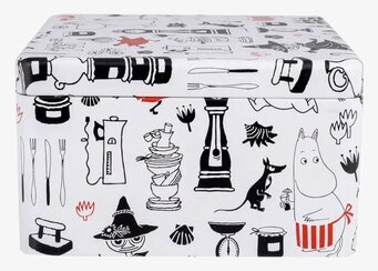 Bild av charmig teburk med muminmotiv och detaljer