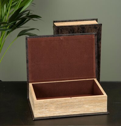 Boklåda Läder från A Lot Decoration på mörk yta med växter