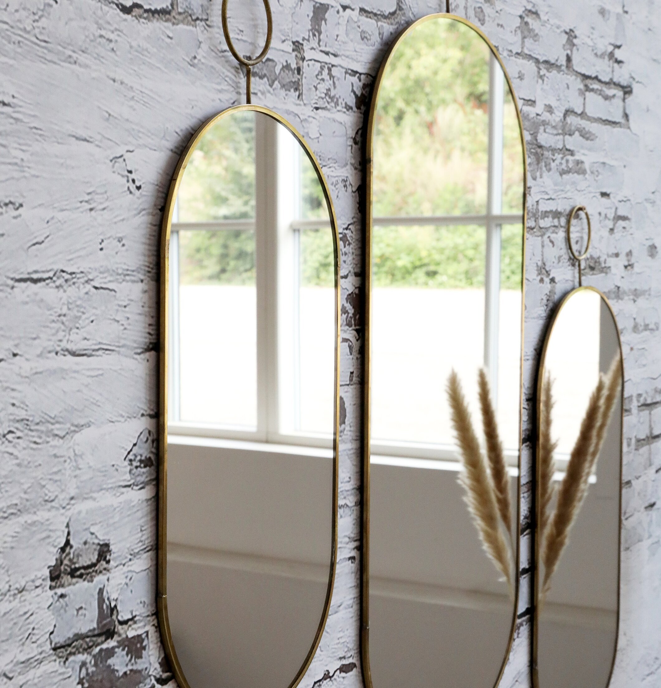 Spegel Antik Mässing Stor från Chic Antique på tegelvägg