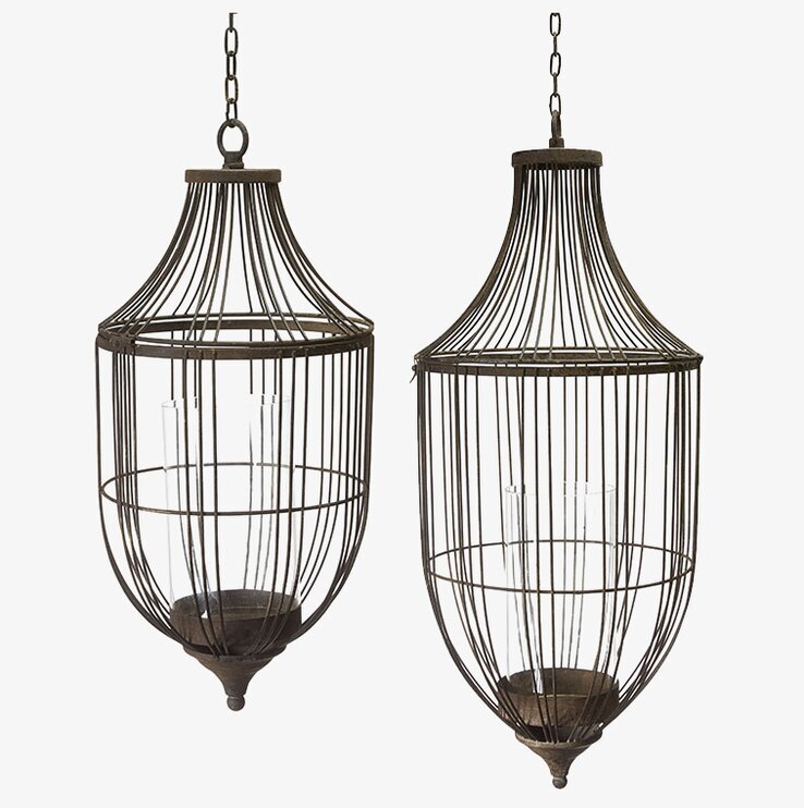 Foto av två eleganta hänglyktor med rostfinish