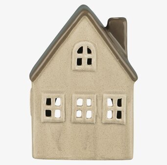 Bild av en dekorativ keramisk ljuslykta i husform