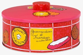 Foto av färgglad plåtburk med kakmotiv och fransk text