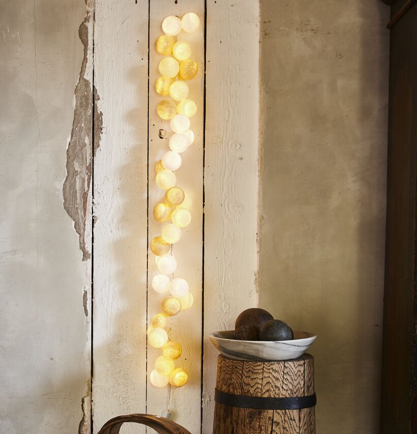 Ljusslinga Happy Lights - Kandi från Happy Lights på träpanel