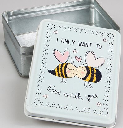 Bild av charmant plåtburk med humoristisk design