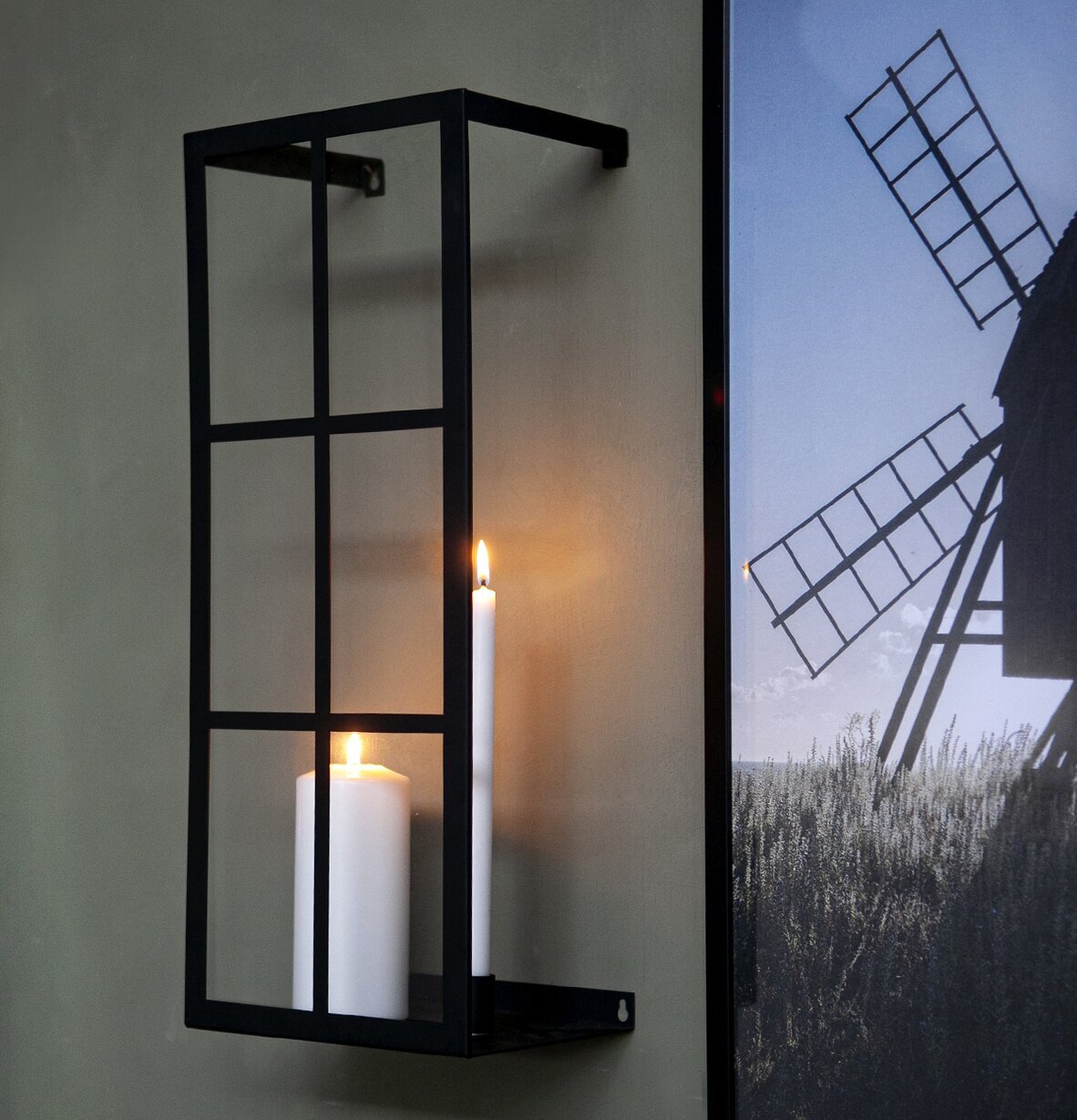 Väggljusstake Bruket Svart från Storefactory på vägg