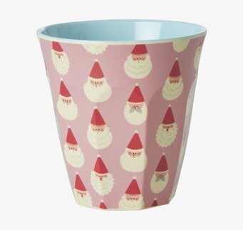 Bild av festlig mugg med tomtemönster och blå insida