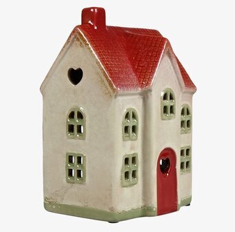 Bild av charmig ljuslykta formad som ett litet hus