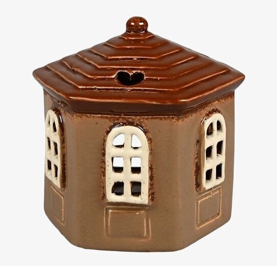 Bild av en sexkantig ljuslykta med hemtrevlig känsla