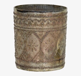 Bild av antik ljuslykta med intrikata mönster