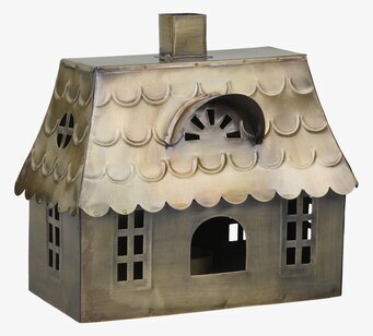 Bild av antik mässingsljuslykta med historisk charm