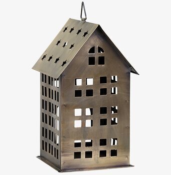 Bild av ljuslykta i antik mässing med hemtrevlig design