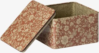 Bild av charmiga plåtburkar med blommönster