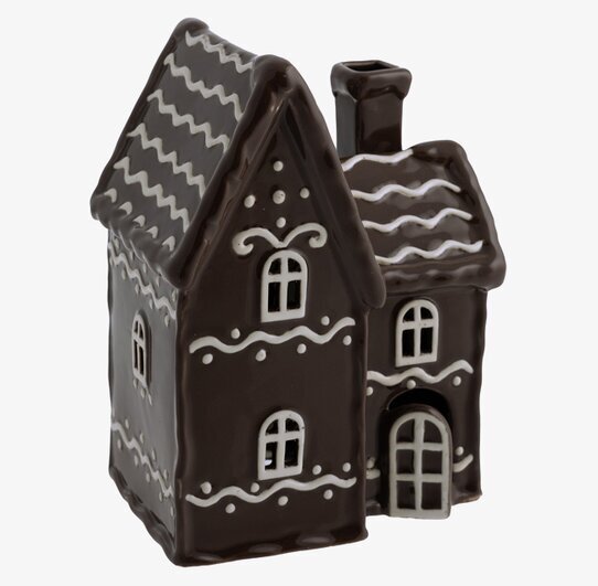 Bild av charmig ljuslykta som liknar pepparkakshus